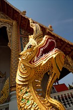Naga figure at the entrance of Viharn Luang