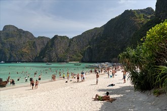 Mass tourism on the sandy beach of Maya Beach