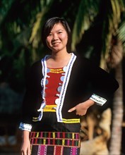 Young Miao woman wearing a traditional ethnic costume