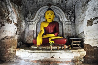 Old Buddha in a temple in Amarapura