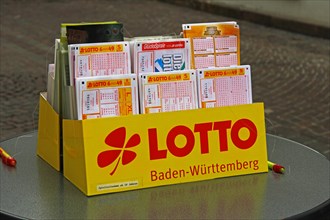 Stand with various lottery coupons