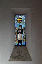 Stained glass window displaying saint Ulrika Nisch