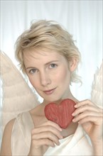 Blonde woman with angel wings