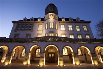 Illuminated Old Town Hall at dusk