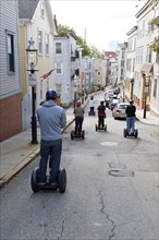 Tourists riding segways in Boston