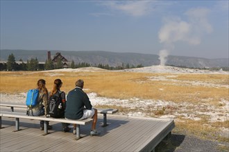 Tourists waiting for the eruption of Old Faithful