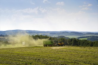 Harvester in action on a field