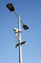 Lantern with a speaker system and video surveillance
