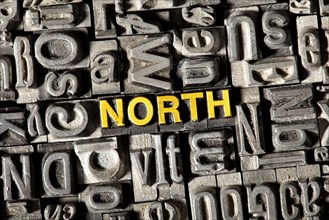 Old lead letters forming the word NORTH