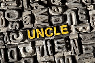 Old lead letters forming the word Uncle