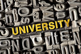 Old lead letters forming the word University