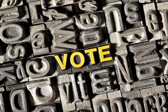Old lead letters forming the word Vote