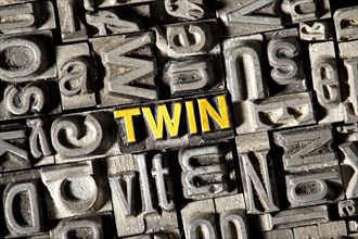 Old lead letters forming the word Twin