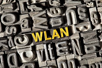 Old lead letters forming the term "WLAN"