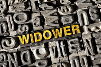 Old lead letters forming the word Widower