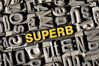 Old lead letters forming the word Superb