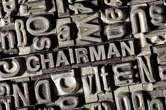 Old lead letters forming the word 'CHAIRMAN'