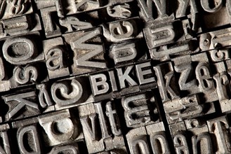 Old lead letters forming the word 'BIKE'