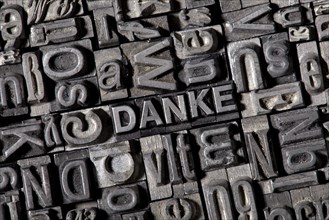 Old lead letters forming the word DANKE