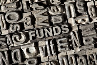 Old lead letters forming the word FUNDS