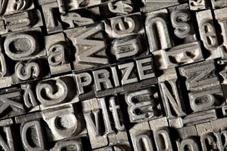Old lead letters forming the word 'PRIZE'