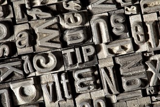 Old lead letters forming the word TIP