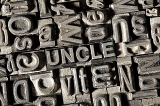 Old lead letters forming the word UNCLE