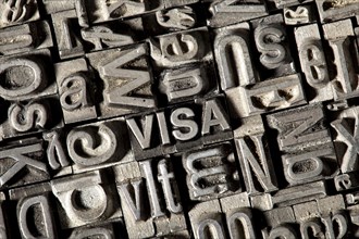 Old lead letters forming the word VISA