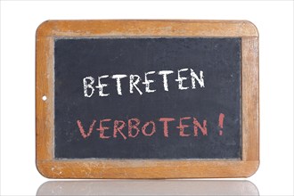 Old school blackboard with the words BETRETEN VERBOTEN!