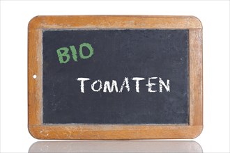 Old school blackboard with the words BIO TOMATEN