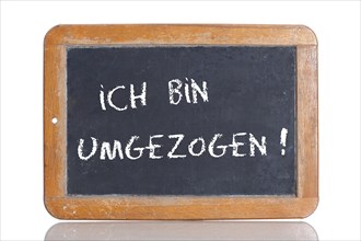 Old school blackboard with the words ICH BIN UMGEZOGEN!