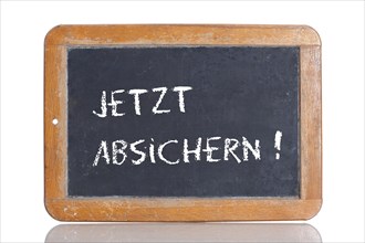 Old school blackboard with the words JETZT ABSICHERN!