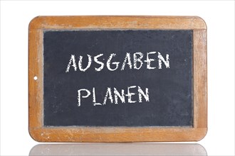 Old school blackboard with the words AUSGABEN PLANEN