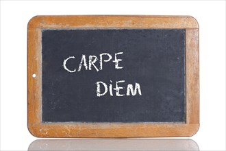 Old school blackboard with the phrase CARPE DIEM