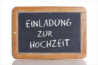 Old school blackboard with the words EINLADUNG ZUR HOCHZEIT