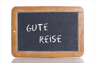 Old school blackboard with the words GUTE REISE