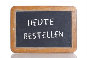 Old school blackboard with the words HEUTE BESTELLEN