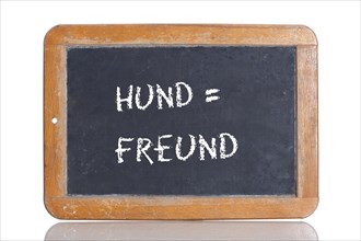 Old school blackboard with the words HUND = FREUND