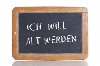 Old school blackboard with the words ICH WILL ALT WERDEN
