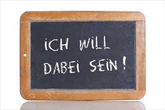 Old school blackboard with the words ICH WILL DABEI SEIN