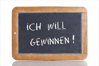 Old school blackboard with the words ICH WILL GEWINNEN!