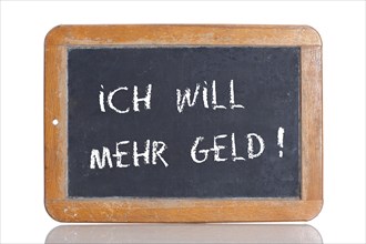 Old school blackboard with the words ICH WILL MEHR GELD!
