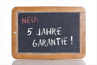 Old school blackboard with the words NEU: 5 JAHRE GARANTIE!