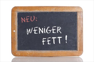 Old school blackboard with the words NEU: WENIGER FETT!