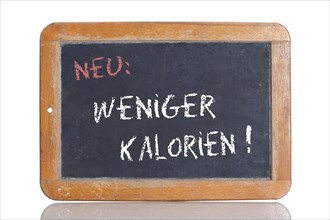 Old school blackboard with the words NEU: WENIGER KALORIEN!