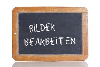 Old school blackboard with the term BILDER BEARBEITEN
