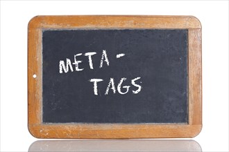 Old school blackboard with the term META TAGS