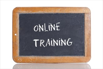 Old school blackboard with the term ONLINE TRAINING