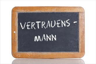 Old school blackboard with the term VERTRAUENSMANN