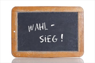 Old school blackboard with the term WAHLSIEG